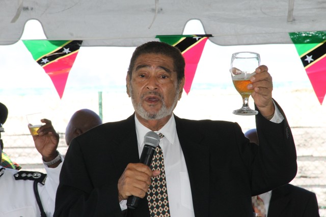 Deputy Governor General His Honour Mr. Eustace John raises a toast on the occasion of the 33rd Anniversary of Independence in St. Kitts and Nevis at the annual Police Toast at the Cicely Grell Hull - Dora Stephens Netball Complex on September 19, 2016, after the Independence Day Parade and Awards Ceremony at the Elquemedo T. Willett Park